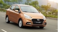 Nen mua xe Hyundai Grand i10 Sedan moi hay Mitsubishi Attrage